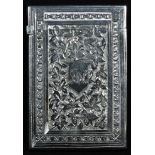 A Victorian silver rectangular visiting card case, bright-cut engraved with scrolling leaves centred