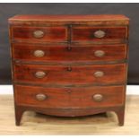 A George IV mahogany bow-fronted chest, of two short and three long graduated cockbeaded drawers,