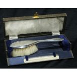 A George V silver child's hair brush, Birmingham 1913, boxed