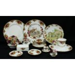 A Royal Albert Old Country Roses pattern dinner plate, tennis set, teacup and saucer, miniature