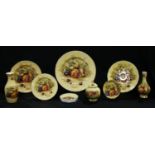 An Aynsley Orchard Gold pattern dinner plate, 27cm diameter, others, two vases, jar and cover,