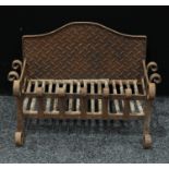 A cast iron country house fire basket