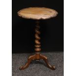 A Victorian mahogany tripod wine table, shaped circular top, barley twist support, scroll legs, 69.