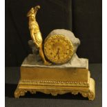 A French gilt brass clock, brass dial with Roman numerals, surmounted by a gilt brass courtly