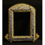 A late 19th/early20th century gilt brass micromosaic photograph frame, the arched frame with griffin