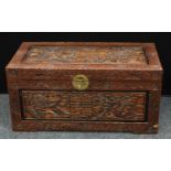 A Chinese inspired hardwood blanket chest, profusely applied with dragons, birds, character marks,