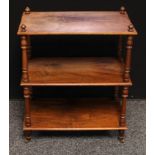 A Victorian oak three tire whatnot/open bookcase, turned supports, Labelled J.Mathews & Sons,