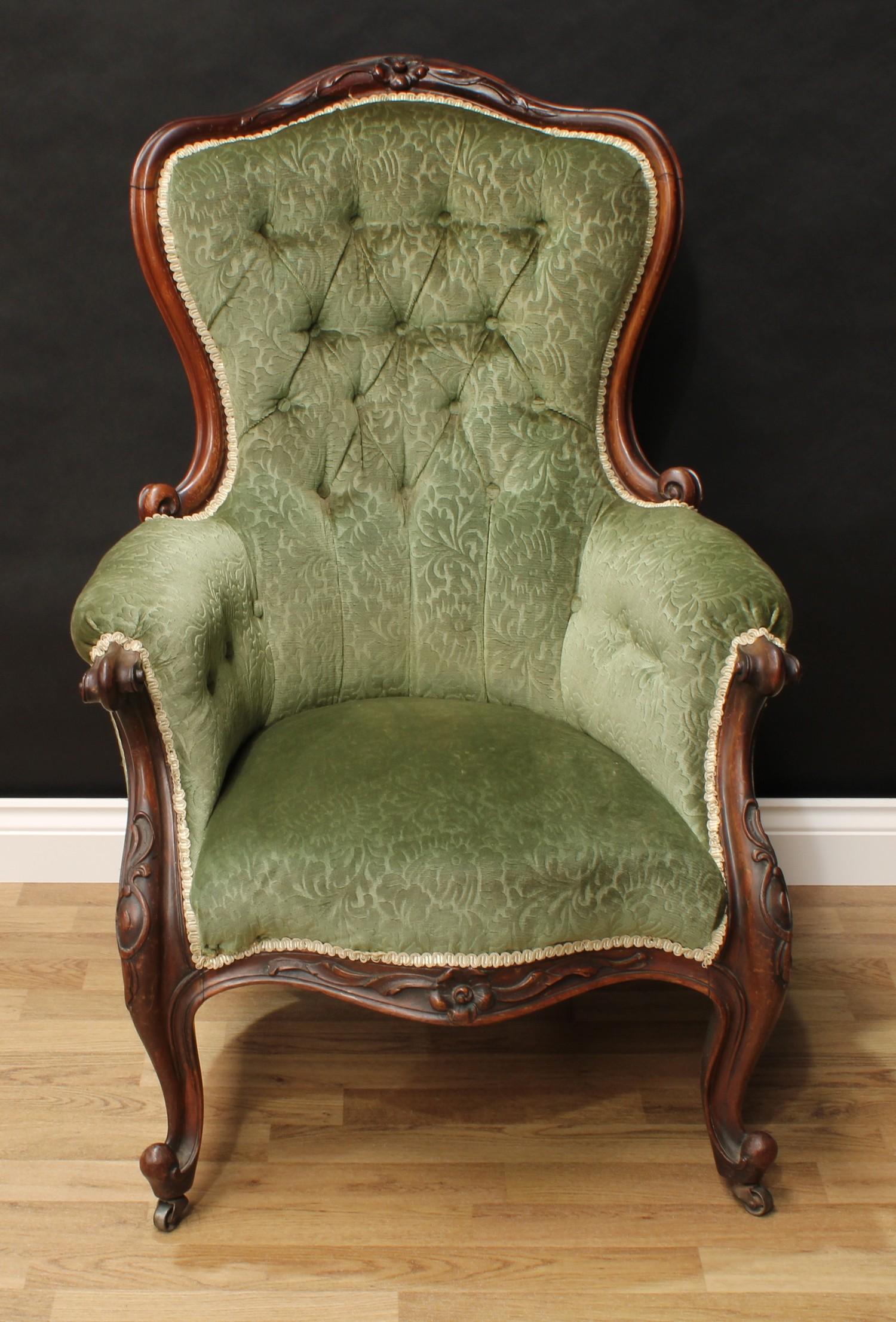 A Victorian rosewood drawing room chair, shaped back with carved serpentine cresting, scroll arms, - Image 2 of 2