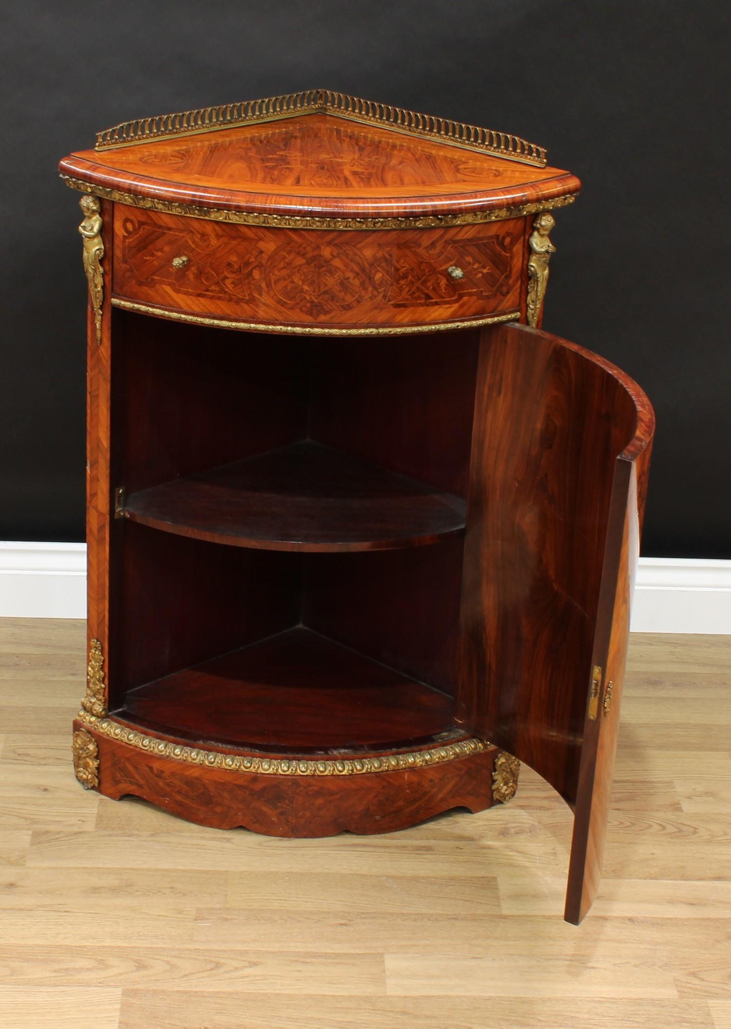 A French Louis XVI Revival gilt metal mounted kingwood and marquetry corner floor cabinet, pierced - Image 3 of 3