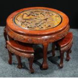 A contemporary Chinese inspired hardwood nesting tea/coffee table and stools, the table top inset