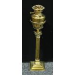 A 19th century brass Corinthian column oil lamp, L&B French reservoir and burner, 64cm high overall