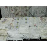 Textiles - hand embroidered table cloths and lace edged linen