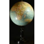 A 12" terrestrial globe, the GlobeTerrestre, by J Forest, Rue de Buci, Paris, turned ebonised