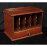 A late Victorian oak country house correspondence rack, three-quarter gallery above a row of five