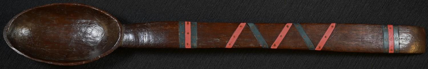 Tribal Art - a hardwood spoon, the stem inlaid with a geometric arrangement of batons, 35.5cm long