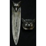 An Edwardian silver novelty bookmark, crested by a fox mask, 7.5cm long, Birmingham 1909; a menu