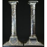 A pair of George III Neo-Classical Old Sheffield plate table candlesticks, in the Adam taste,