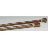 A Black Forest style fell walking stick, the pommel as the head of a spaniel dog, 125cm long;