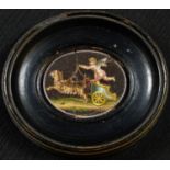 A 19th century Italian micromosic oval panel, depicting an amorino in a chariot drawn by tigers, 3.