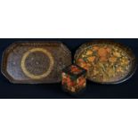 A Kashmiri papier mâché rectangular playing card box, typically decorated with flowers, 8cm high; an
