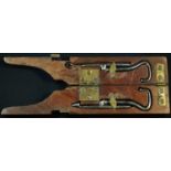 A 19th century mahogany combination boot jack and pull suite, the brass flush-catch enclosing a