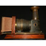 A large Victorian table-top mahogany, brass and tin parlour magic lantern, by Ross, London, 68cm