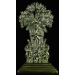 A late 19th century brass pocket watch stand, cast as a wheatsheaf, stepped rectangular base, 18cm