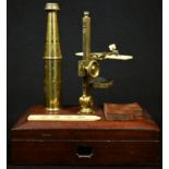 A 19th century lacquered brass monocular travelling field microscope, rack and pinion adjustment,
