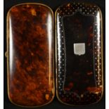 A 19th century tortoiseshell and pique rounded rectangular gentleman's pocket cigar case, inlaid