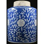 A large Chinese blue and white cylindrical jar, painted in underglaze blue with flowerheads and