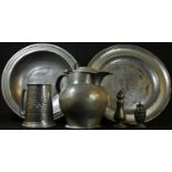 A George III bulbous pewter ale flagon, hinged cover, scroll thumbpiece and handle, circular base,