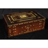 A 19th century Indian hardwood and ivory marquetry rectangular box, hinged cover centred by a