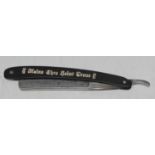 A WWII German cutthroat razor, with Waffen SS 'Mein Ehre Heist Treue' SS etched onto handle