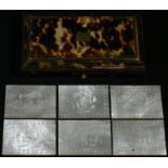 A 19th century tortoiseshell rectangular counter box, hinged shallow sarcophagus cover, enclosing