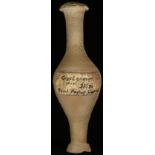 Antiquities - an Ancient Greek earthenware unguent phial, 17cm long, Cyprus, c. 325BC