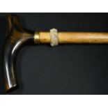 A 19th century marine bone walking stick, the shaft possibly a whale rib, serpentine L-shaped