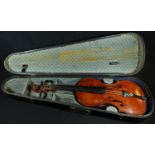 A violin, the two-piece back 35.5cm excluding button, paper label inscribed in ink J W Tipper, Derby