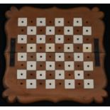 An Anglo-Indian sandalwood folding travelling chess board, shaped angles, 16cm square (open), c.1900