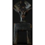 Tribal Art - a Baule zoomorphic heddle pulley, the figurative finial with antelope features, 13cm