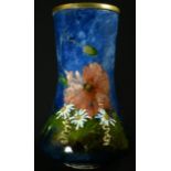 An Art Pottery vase, painted impasto with flowers on a mottled blue ground27cm high, signed EG and