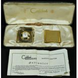 A Colibri gilt metal novelty combination watch/lighter, monogas mechanism, 4.5cm long, cased with