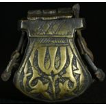 A Middle Eastern brass betel box, hinged cover, strap lugs to sides, 4.5cm long
