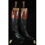 A pair of leather riding boots, beech trees, retailed by Rowell, Melton Mowbray, 65cm high
