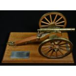A scratch-built desk model of a field gun, by A T Underwood B.E.M, engraved plaque inscribed 'This