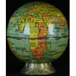 An early 20th century novelty cartographic pencil sharpener, as a globe, 4.5cm high