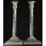A pair of George III Gothick Old Sheffield plate cluster-column table candlesticks, stepped square