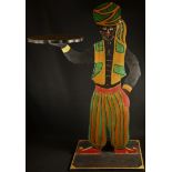 A polychrome painted 'blackamoor' dummy board waiter, as a Turkish attendant offering a tray, 85cm