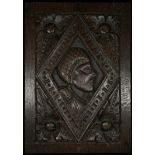 A North European oak panel, carved with a bust length portrait of a lady, within a lozenge, acanthus