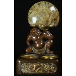 A Japanese bronze novelty two-section inkwell, mounted with a demonic sumo supporting a fluorspar