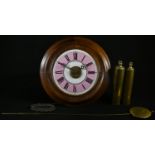 A 19th century postman's alarm clock, 17.5cm pink and white enamel dial inscribed with Roman